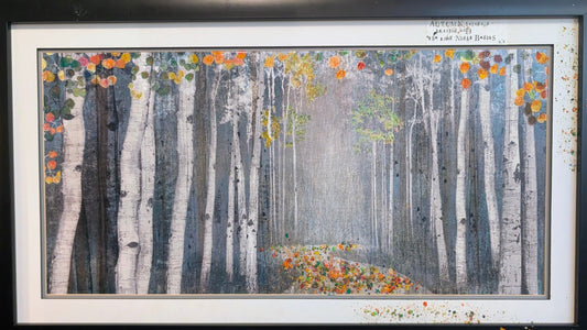 Framed artwork of a fall forest scene with trees and foliage.